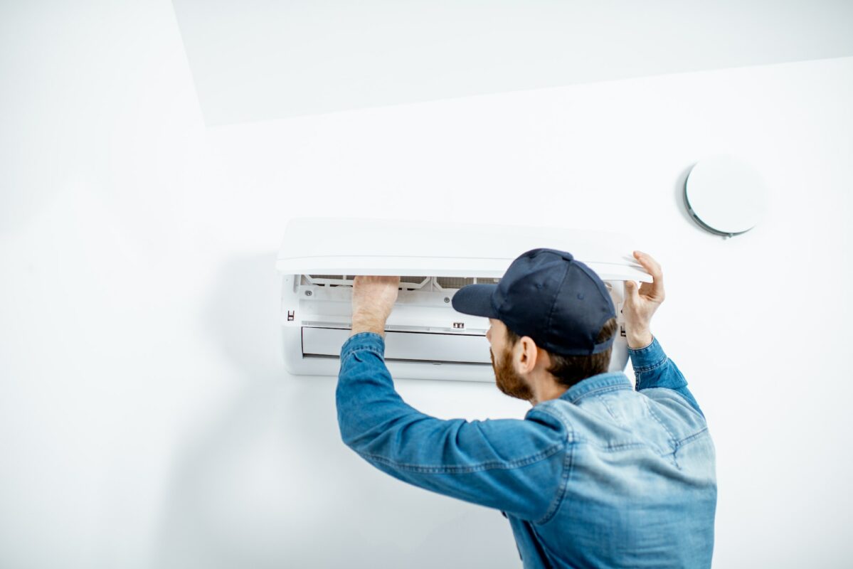 Man serving the air conditioner